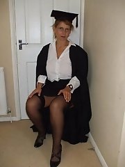 British busty MILF dressed as a school mistress
